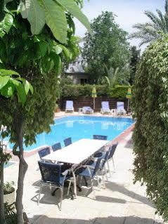 Renos Hotel Apts Polis Exterior foto